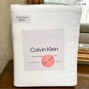 Calvin Klein California King Sateen Sheet Set in Crisp White.